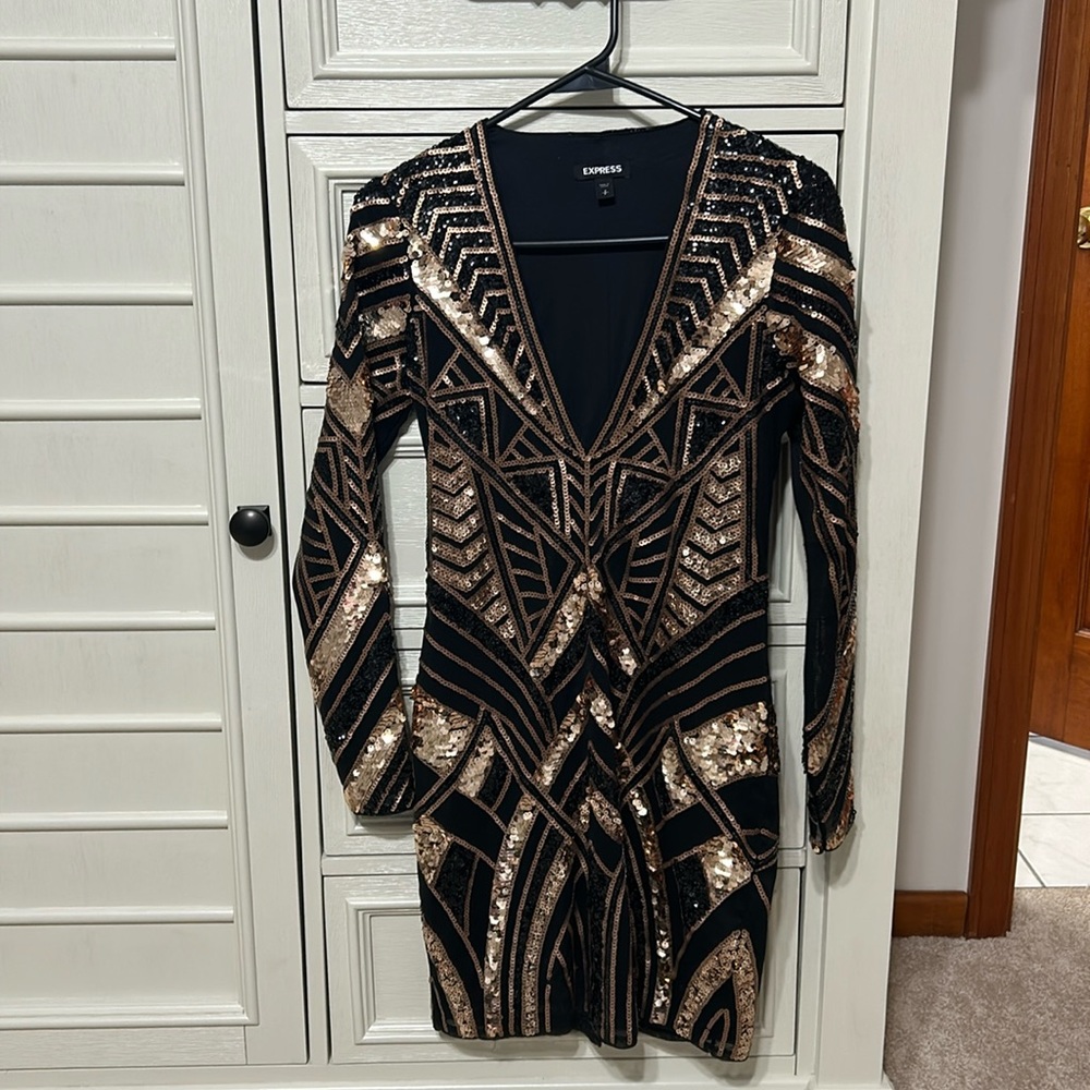 Black and gold sequin, deep v-neck, mini dress.